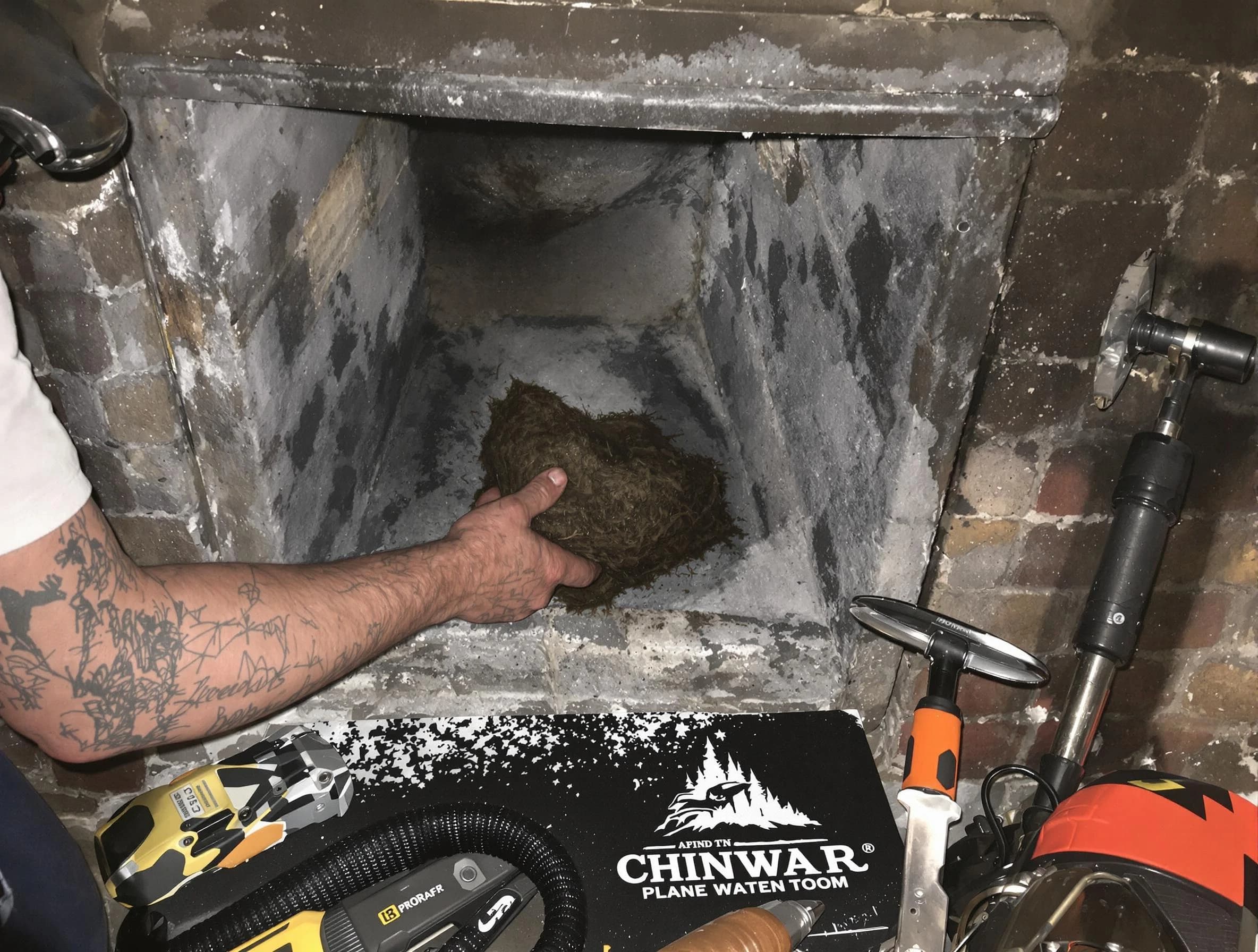 Sugar Hill Chimney Sweep safely removing debris and screening chimney in Sugar Hill, GA