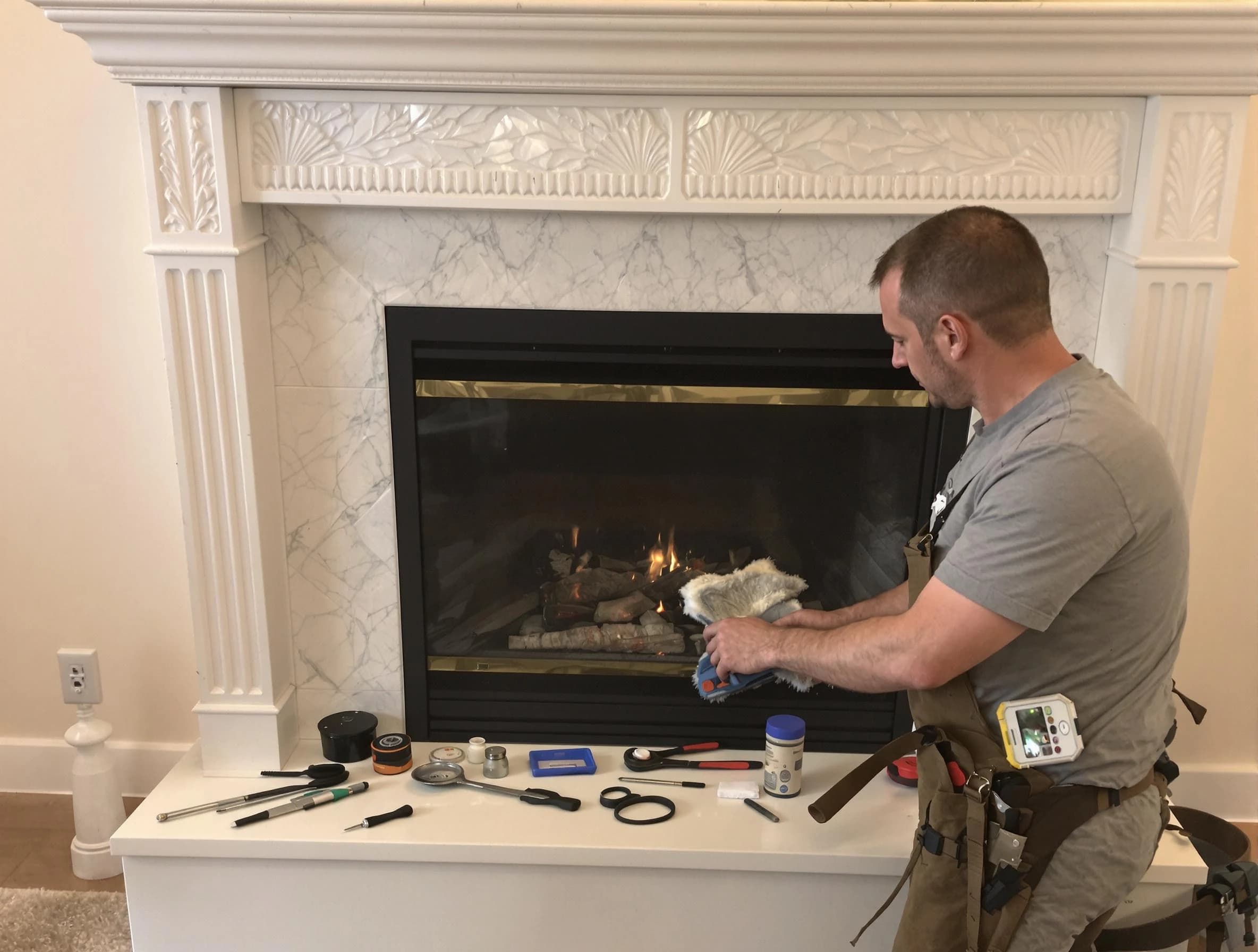 Sugar Hill Chimney Sweep performing fireplace maintenance in Sugar Hill, GA